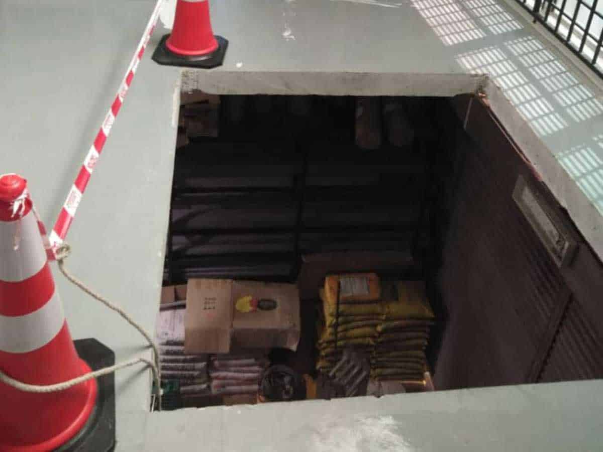 Figure Shows Goodshoist Opening in a Hardware Shop